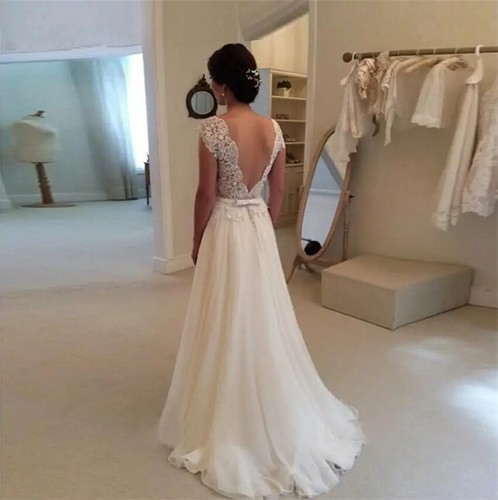 Elegantes vestidos de novia de playa con cuello en O línea en A apliques de encaje sin espalda - Imagen 4 de 8