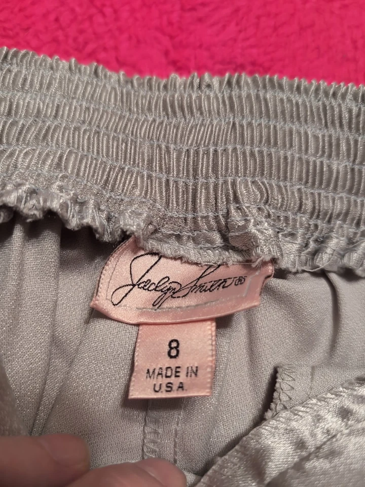 Pantalones vintage Jaclyn Smith talla 8 cintura alta plisados satén plateados  Foto 4 de 4