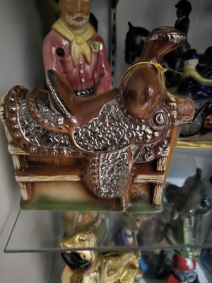 Ezra Brooks Whiskey decanter in the shape of a saddle,  1970s. Collectible