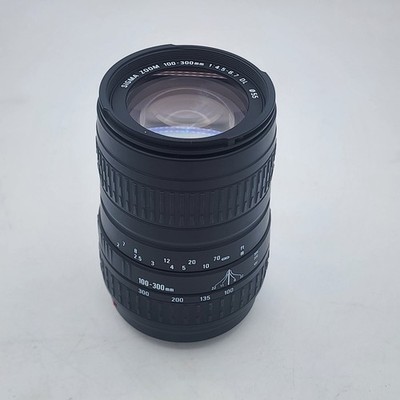 Sigma DL 100-300mm f/4.5-6.7 DL AF Lens For Minolta/Sony A w/Hood Caps UV Filter