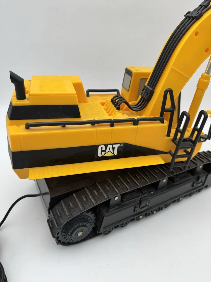 Excavadora Toy State Industrial Caterpillar CAT 1993 de colección con cable R/C probada funciona Foto 4 de 4