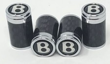 White B Logo On A Black Background Carbon Fiber Tire Valve Caps -like Bentley