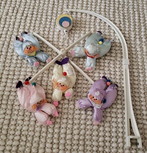 Musical Mobile with pastel clowns-  Vintage 1980’s Jolly Jumper  WORKS!