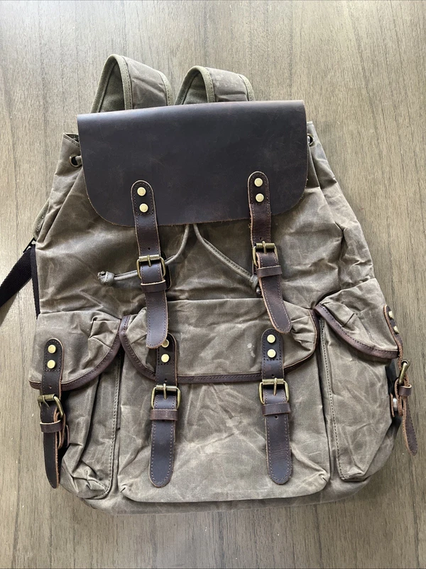 waxed canvas and leather travel backpack