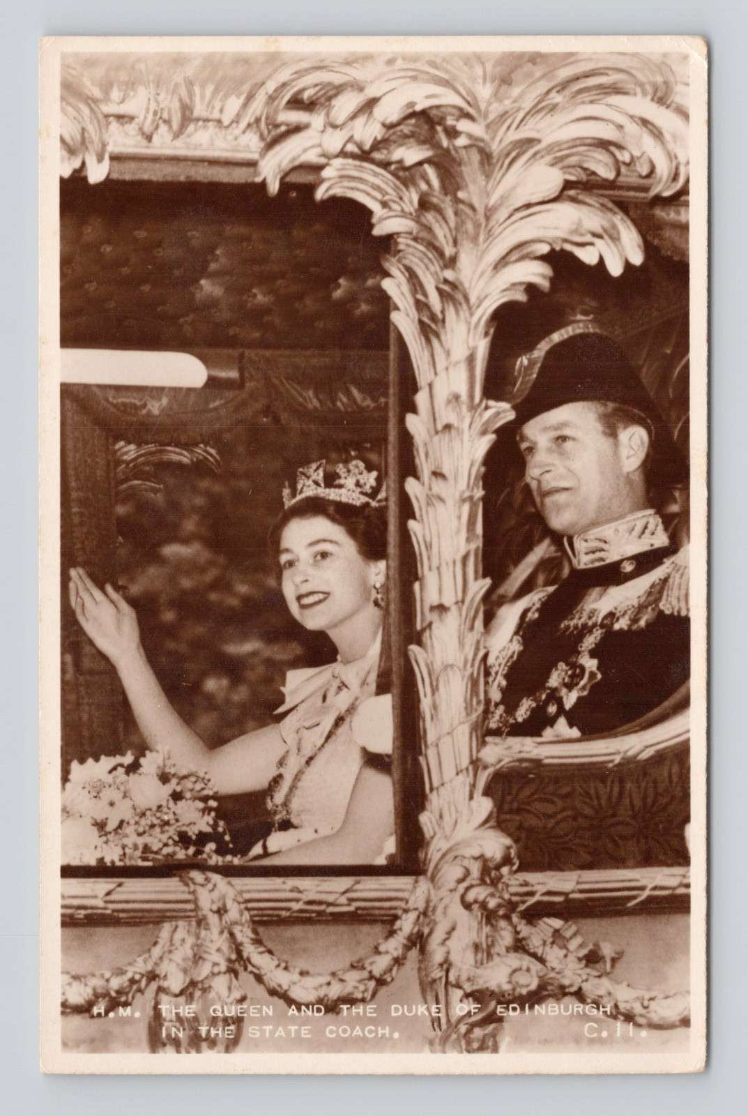 Postcard H.M. the Queen and the Duke of Edinburgh in the state coach RPPC
