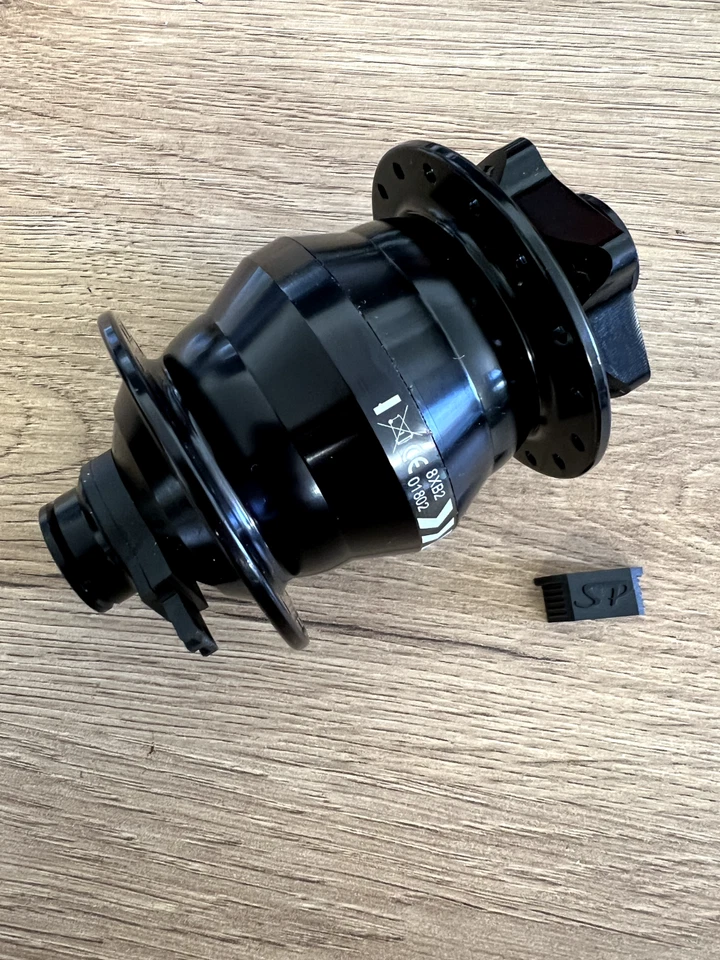 Moyeu dynamo Shutter Precision PD-8X QR15 1 vitesse 32H - 6V 3W - 6 boulons -... - Photo 2/4