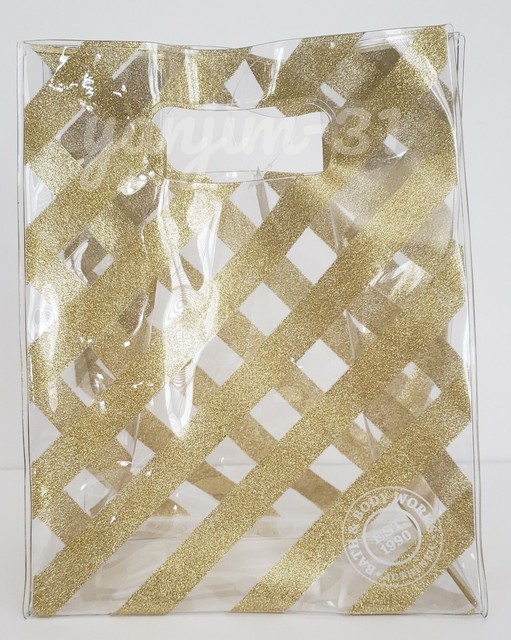 BATH AND BODY WORKS PLASTIC/PVC GIFT BAG SMALL GOLD STRIPED/CLEAR