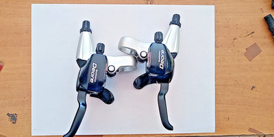 PAAR STEUERHEBEL MIT BREMSHEBELN SHIMANO DEORE 3 X 9 DUAL CONTROL