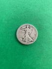 US WALKING LIBERTY HALF DOLLAR; DAMAGED
