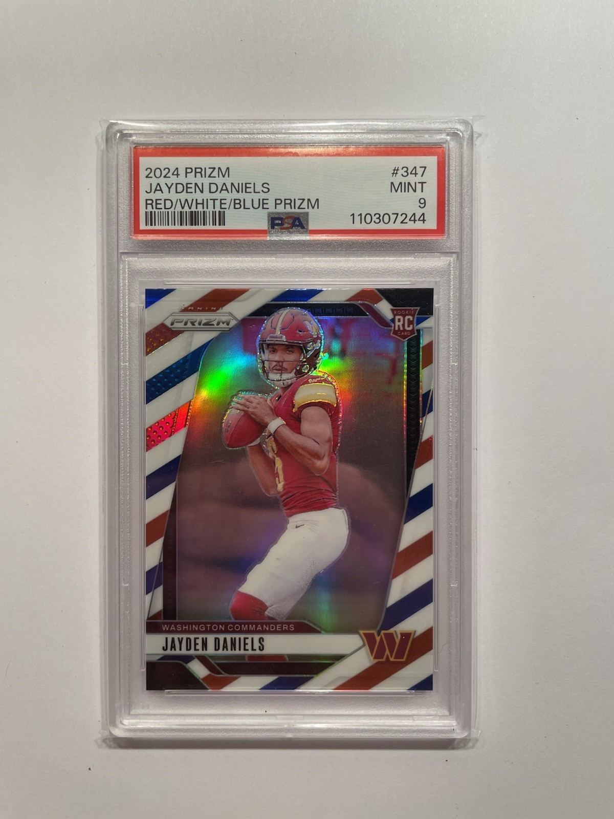 2024 Panini Prizm Rookie - Jayden Daniels #347 Red White Blue Prizm (RC) - PSA 9