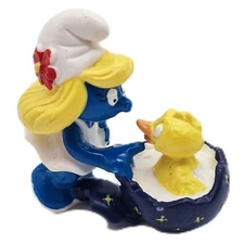 Schleich® Smurfs Figurine - Smurfette Easter with chick (520513)