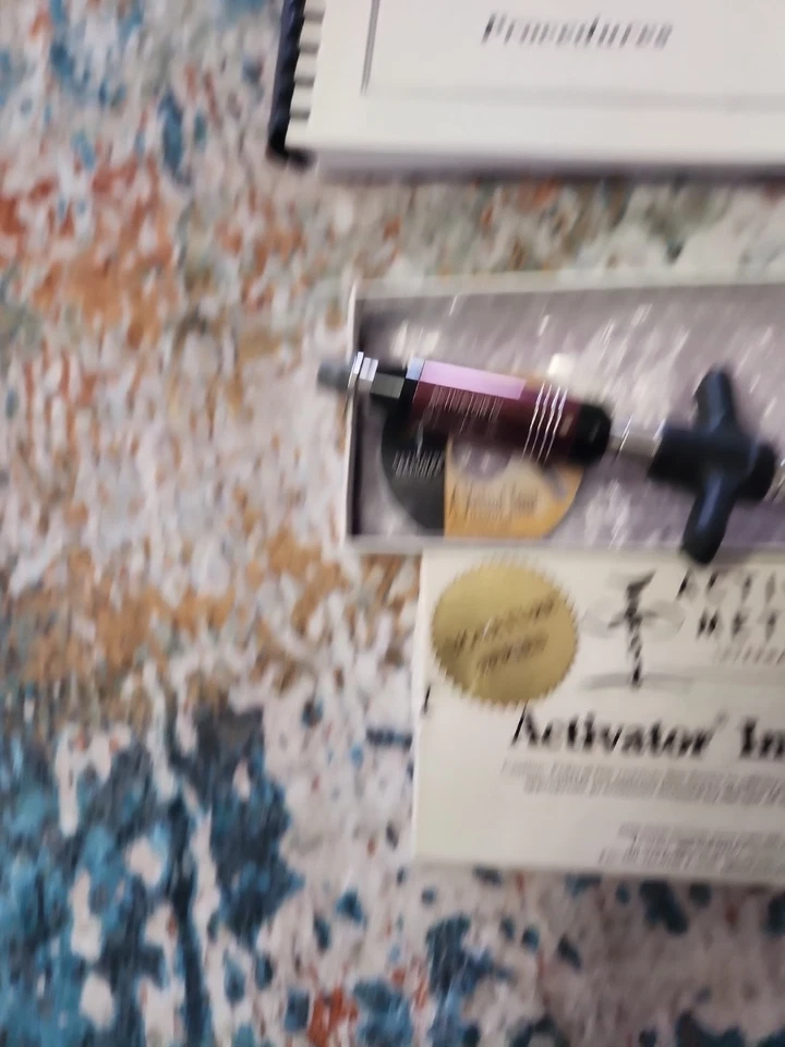 Instrumento Quiropráctico Activator IV con Herramienta de Ajuste de Caja y Tectbooks Foto 3 de 3