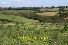Photo 6x4 Valley near Trecaine St Ewe The field in the foreground looks l c2006
