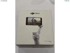 DJI OM 4 Smartphone Gimbal Stabilizer with Tripod Grey and Boxed