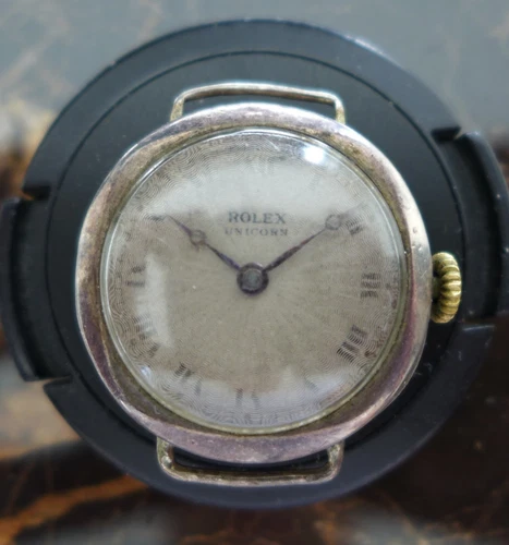 A OLD VINTAGE 1915 LADIES ROLEX UNICORN WATCH IN SILVER R.W.C.Ltd CASE