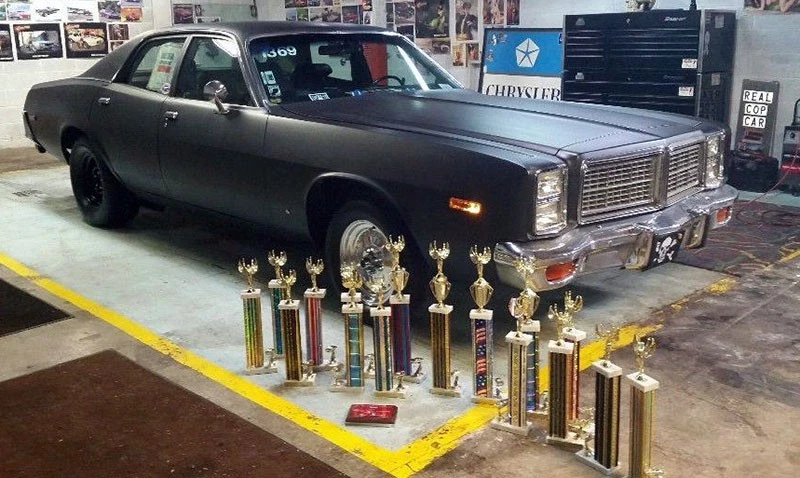 Four-hundred-forty cubic inches of fun await the buyer of this nondescript Dodge Monaco police car.