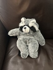 vintage 1990s "Gurilla Biscuit" raccoon plush backpack by JayGur Import Inc.