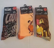 3 Pairs Of Disney Crew Socks Mufasa,Cruella,Pumba/Timone New With Tags Sz 9-13