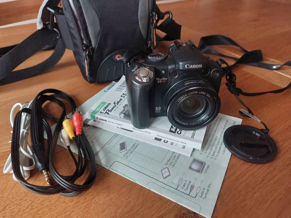Canon PowerShot S5 IS 8.0MP Digital Camera incl. wide angle and telephoto lenses, photo 1 of 2