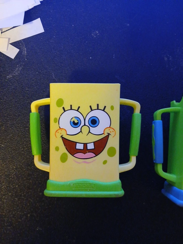 Juego de 2 soportes para caja de jugo Munchkin Bob Esponja Grip 'n Sip Foto 2 de 4