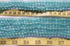 9 x 6mm Crow Roller Glass Beads Light Trans Aqua Crafts Jewelry Making 100pcs