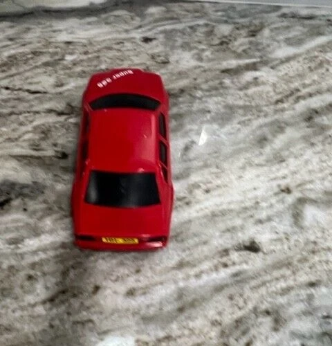 Coche de plástico rojo BMW 325 Rally sedán años 80 vintage Foto 3 de 4