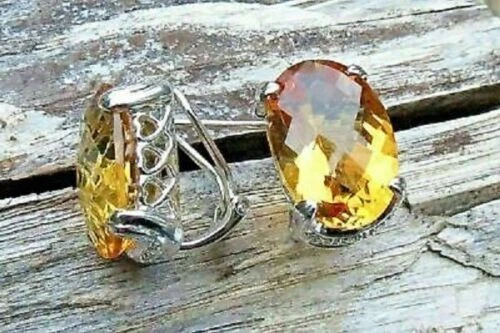 Aretes de oro blanco de 14 quilates solitario de citrino ovalados de 6 quilates con cierre trasero Omega Foto 2 de 4