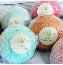 Scented Bath bombs with natural flowers, and or herbs, CBG oil and crystals.