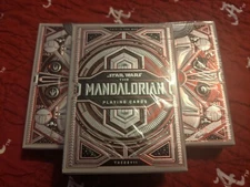 One deck of Theory11 Mandalorian Playing Cards, in hand and ready to ship