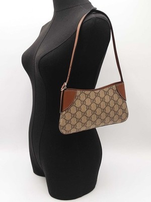 Gucci Gg Emblem Small Shoulder Bag In Monogram Coated Canvas