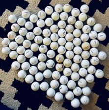 100 Titleist golf balls 2A/shag including premium models. See photo.