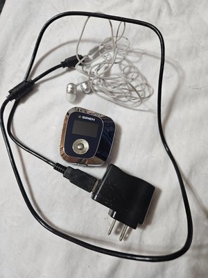 Bundle Mp3 player 2006 with earphones and  USB cord, for home or office use.