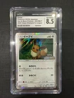 2019 POKEMON CGC 8.5 NM/MINT+ SM PROMO 403 EEVEE-HOLO CHAMPION'S LEAGUE