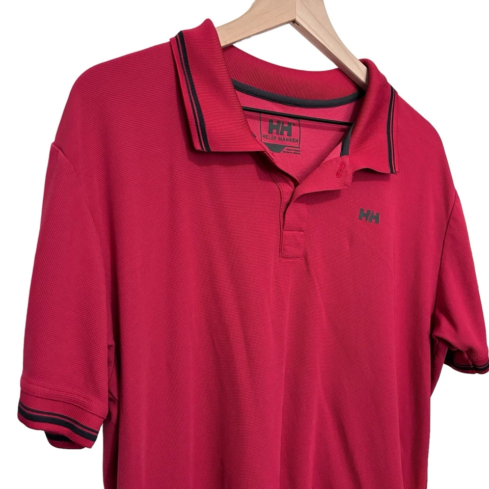 Polo con logo rojo granate de Helly Hansen para hombre talla grande Foto 2 de 4
