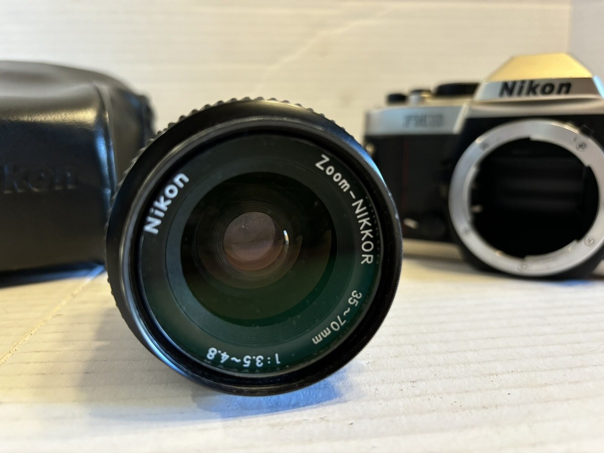 Nikon Camera FM10 35mm Film With 35-70 mm lens and Leather Nikon Camera FM10 35mm Film With 35-70 mm lens and Leather
