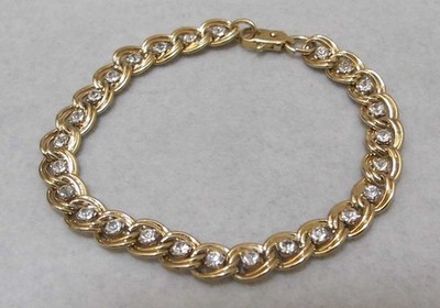 Double Loop Gold Tone Links Clear Faceted Rhinestones 6  Tennis Bracelet