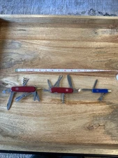 Vintage Set Of 4 Swiss Army Knives