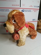 Vintage St Bernard Plush Dog with Bank Barrel. 16" Long, 13" Tall
