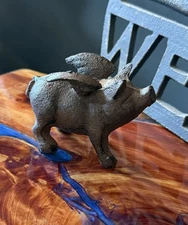 Whimsical Cast Iron Small Flying Pig Figurine - Rustic Animal Decor