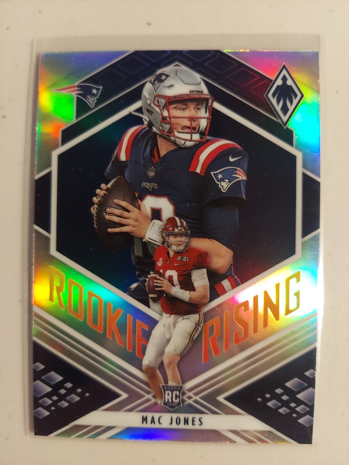 2021 Panini Phoenix Mac Jones Rookie Rising Silver #RIS-9 Patriots
