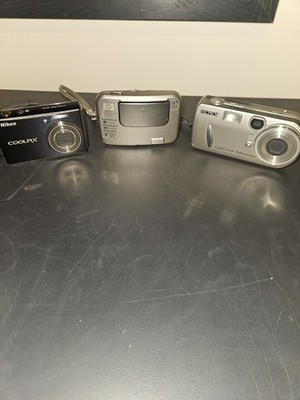Nikon Coolpix, HP Photosmart, And  Sony  Cybershot for PARTS OR REPAIR ONLY