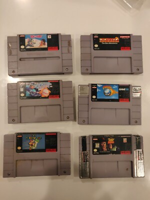 Lot of Super Mario World pac-man 2 Ken Griffey winning run Pinball dreams SNES