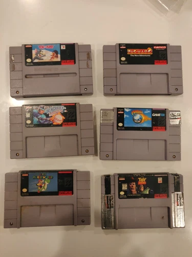 Lot of Super Mario World pac-man 2 Ken Griffey winning run Pinball dreams SNES