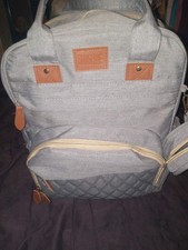 diaper bag/ backpacks with changing pad. One grey one pink available.