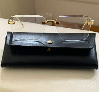Cartier rahmenlose Brillenfassung aus Metall in Gold mit Etui   Unisex