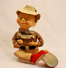 Vintage wind up musical pixie doll plays Happy Days