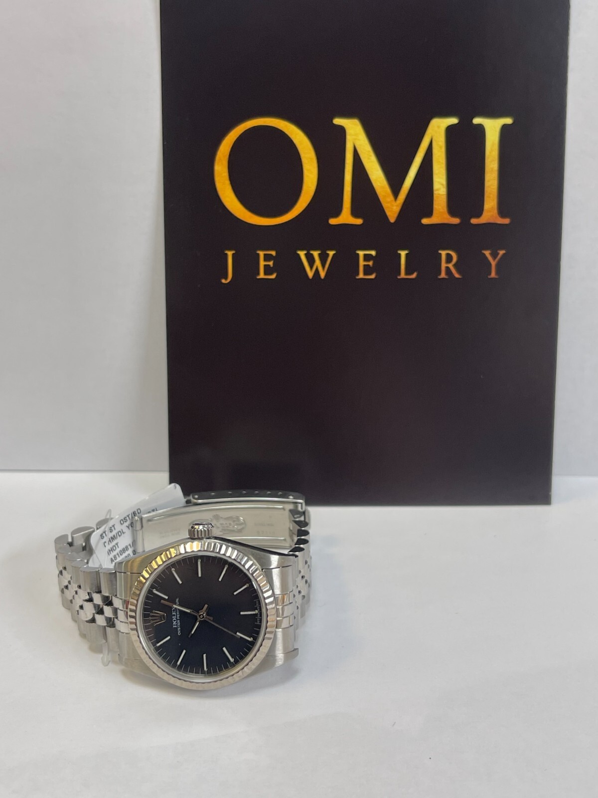 Rolex Oyster Perpetual 31mm Black Dial Stainless Steel Watch Model 77483