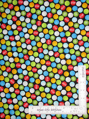 Stop Sign Go Circle Road Signs Fabric By the Yard Cotton by Henry Glass Hero
