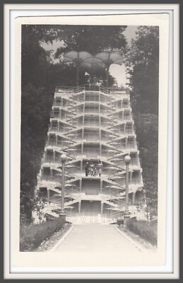 Interesting unusual building distant figure architecture upstairs pattern photo