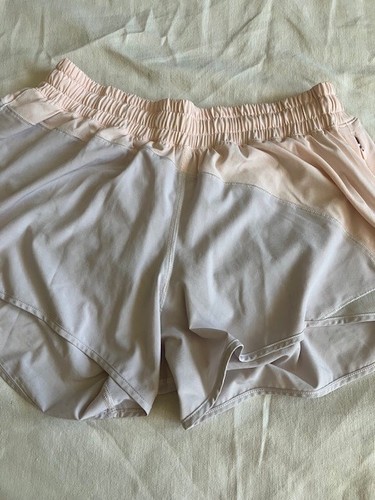 Pantaloncini Lululemon foderati grigio e pesca cuciture interne 4" taglia 10 - Foto 2 di 5